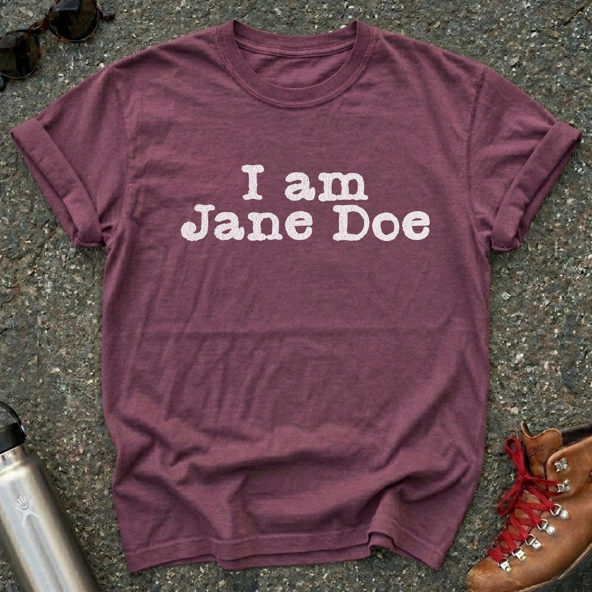 Comfort Colors t-shirt with distressed white typewriter lettering reading I am Jane Doe