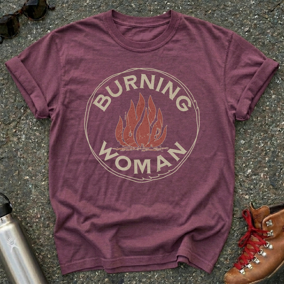 Comfort Colors t-shirt with a distressed red flame in a vintage circle badge and the words Burning Woman