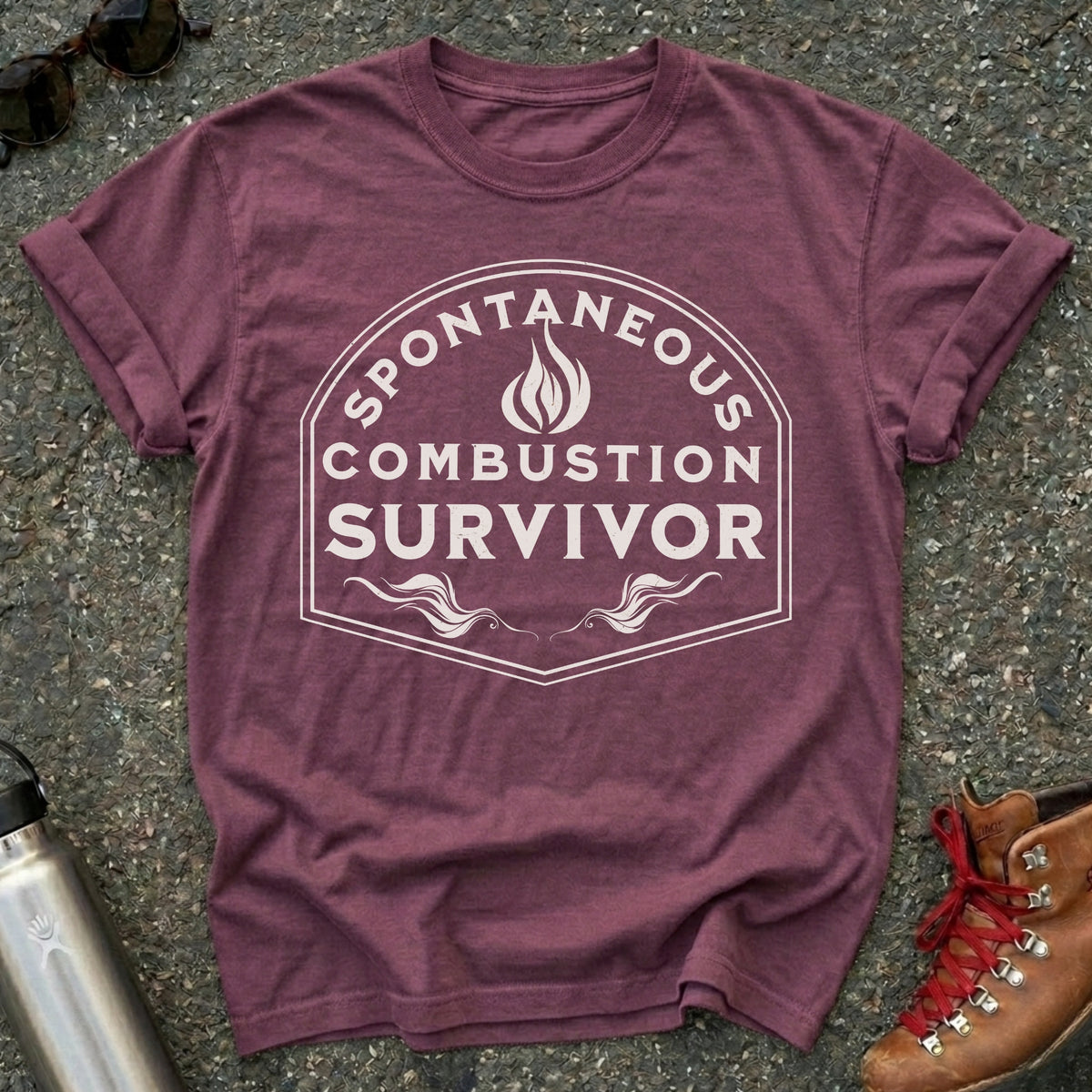 Comfort Colors t-shirt with a vintage flame badge reading Spontaneous Combustion Survivor