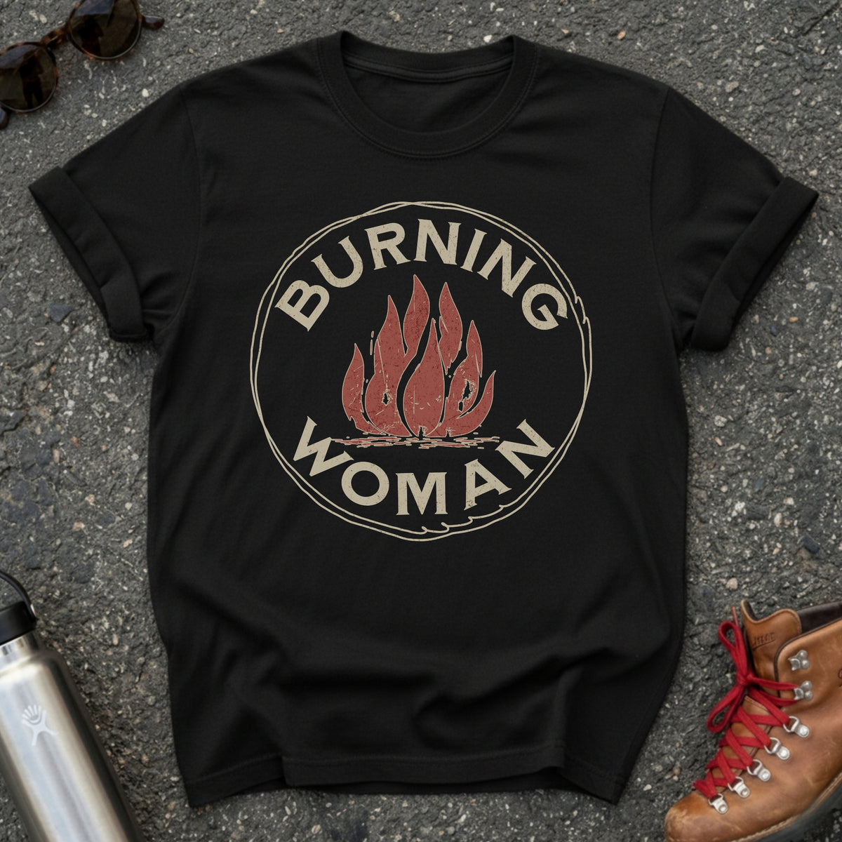 Comfort Colors t-shirt with a distressed red flame in a vintage circle badge and the words Burning Woman