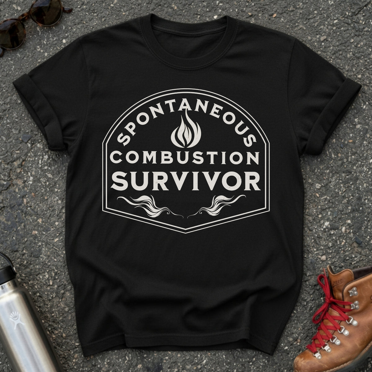 Comfort Colors t-shirt with a vintage flame badge reading Spontaneous Combustion Survivor
