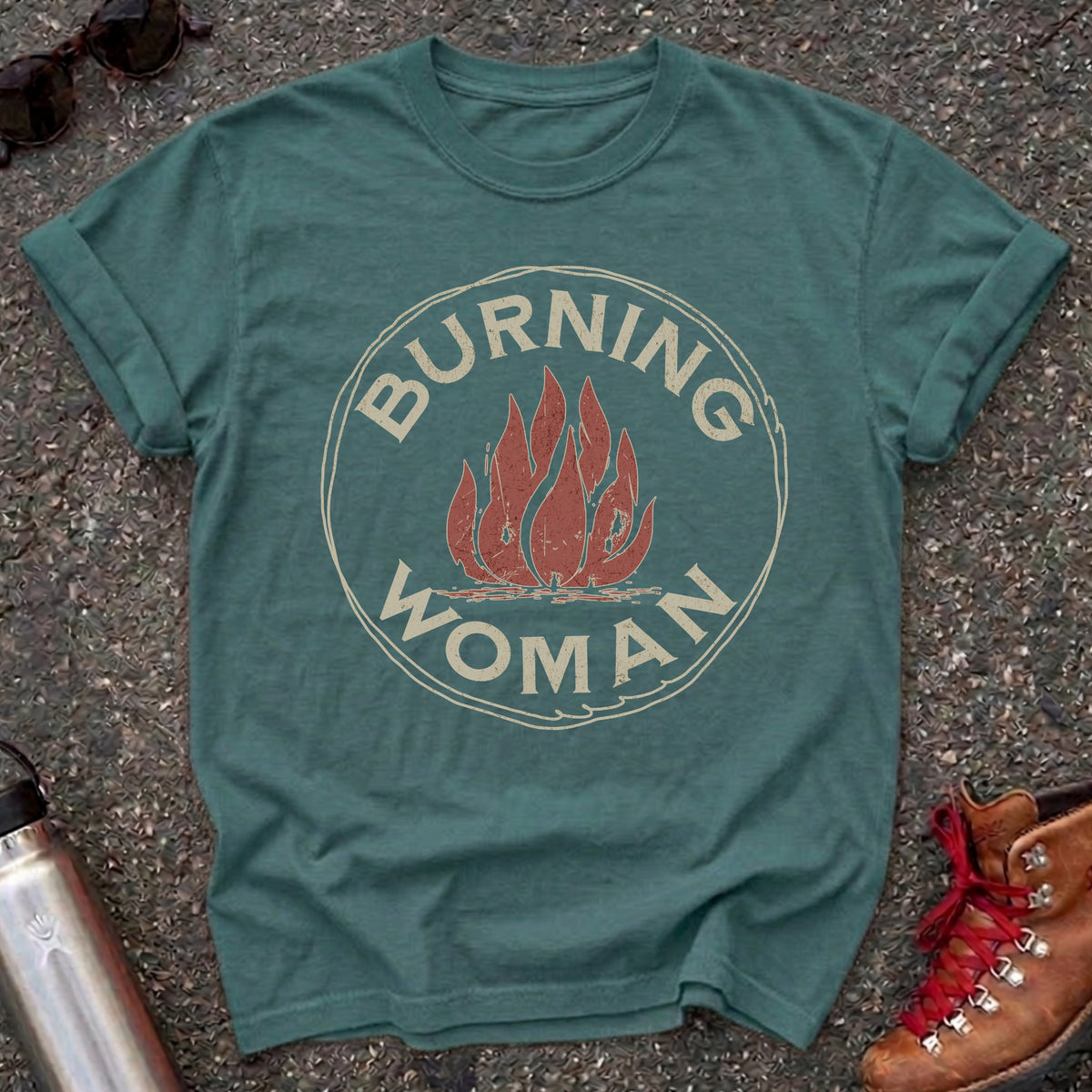 Comfort Colors t-shirt with a distressed red flame in a vintage circle badge and the words Burning Woman