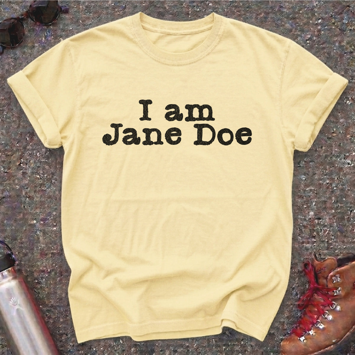 Comfort Colors t-shirt with distressed white typewriter lettering reading I am Jane Doe