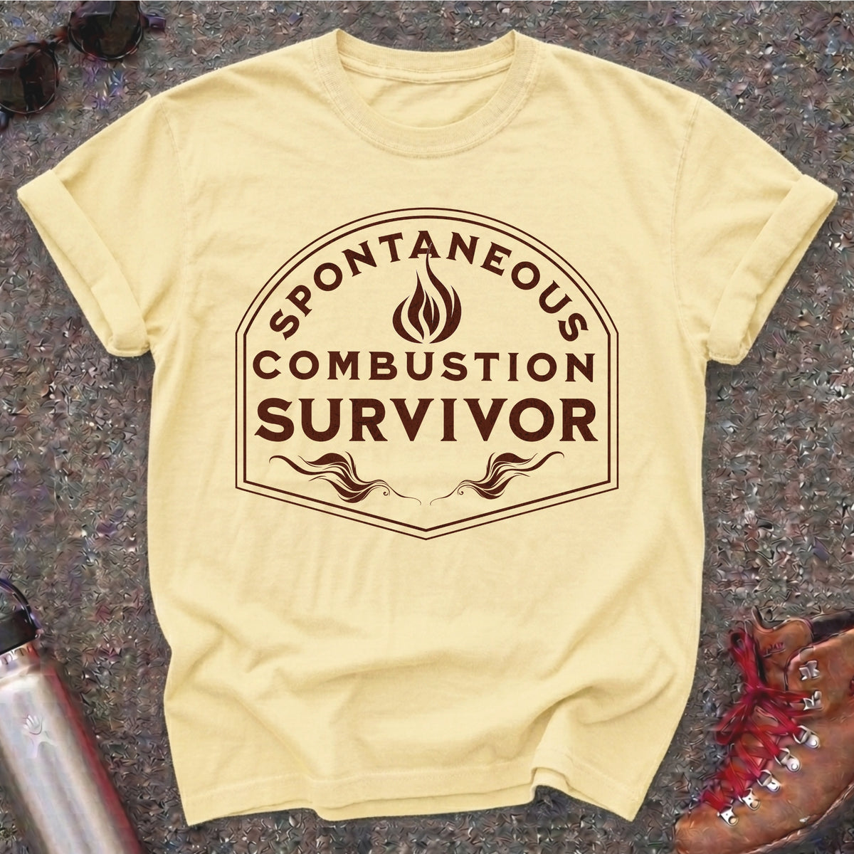 Comfort Colors t-shirt with a vintage flame badge reading Spontaneous Combustion Survivor