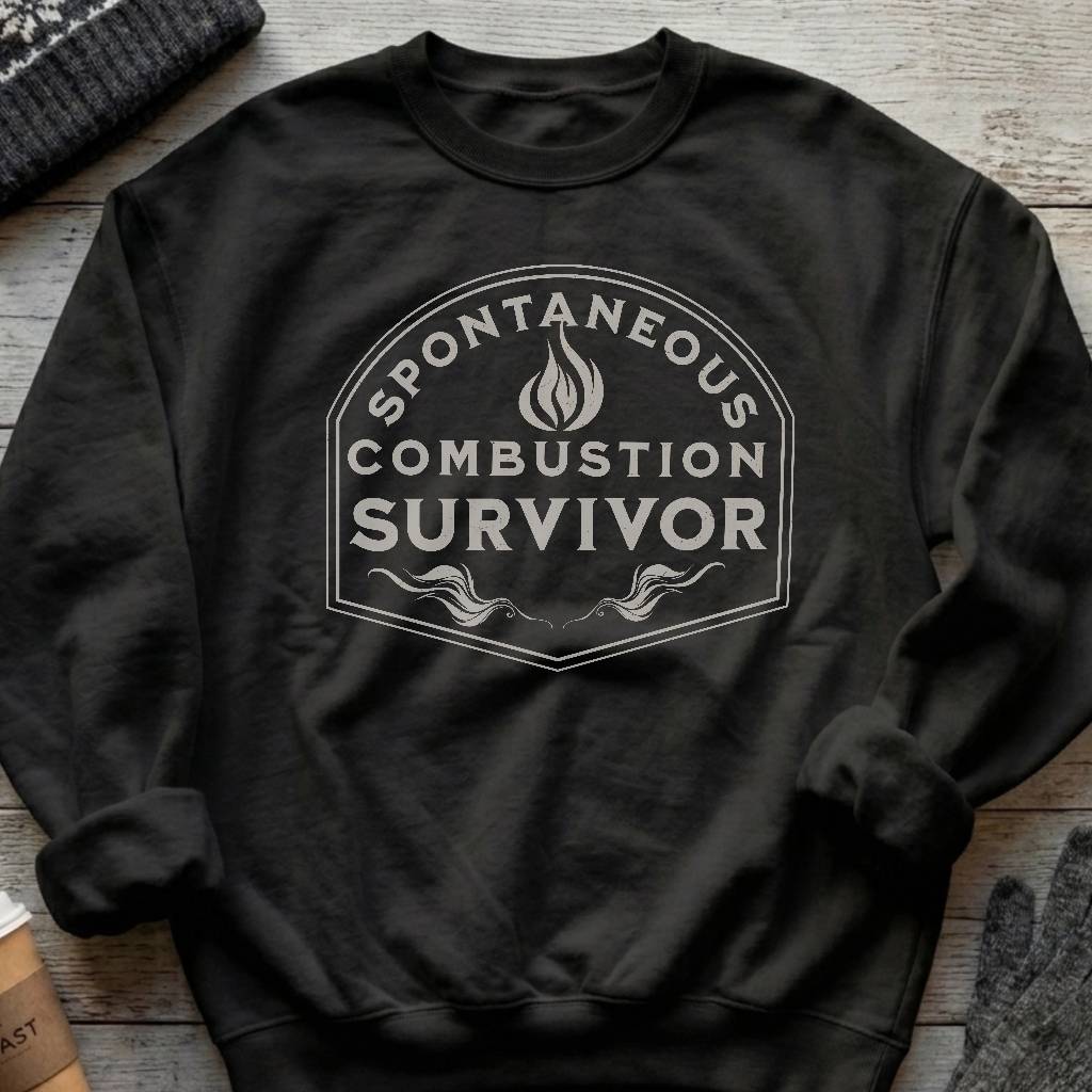 Crewneck sweatshirt with a vintage flame badge reading Spontaneous Combustion Survivor