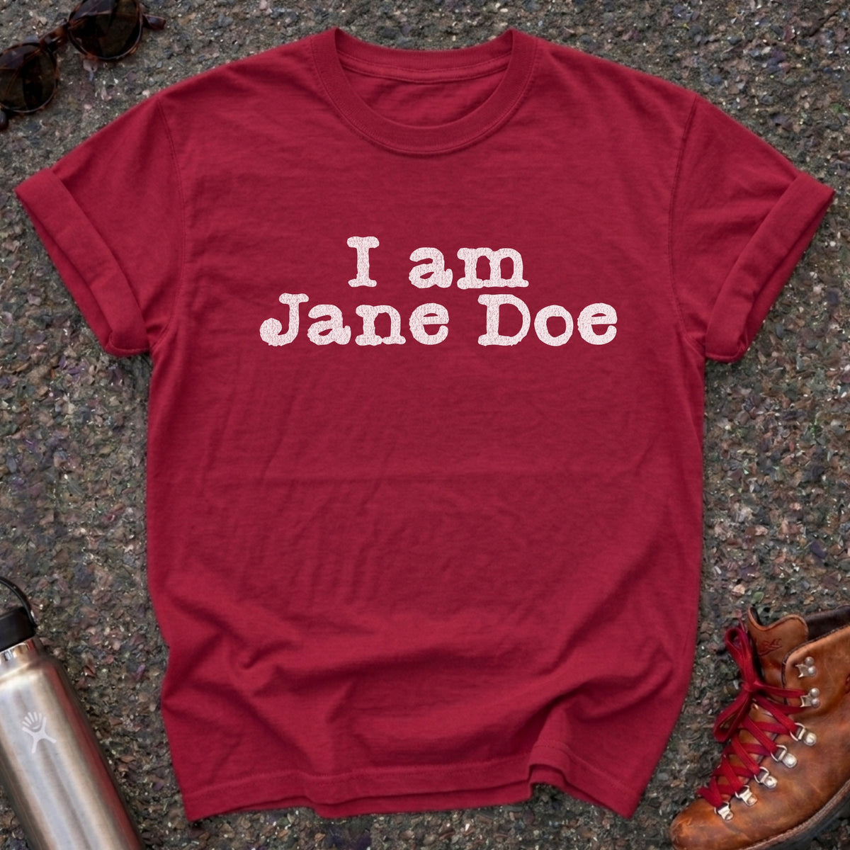 Comfort Colors t-shirt with distressed white typewriter lettering reading I am Jane Doe