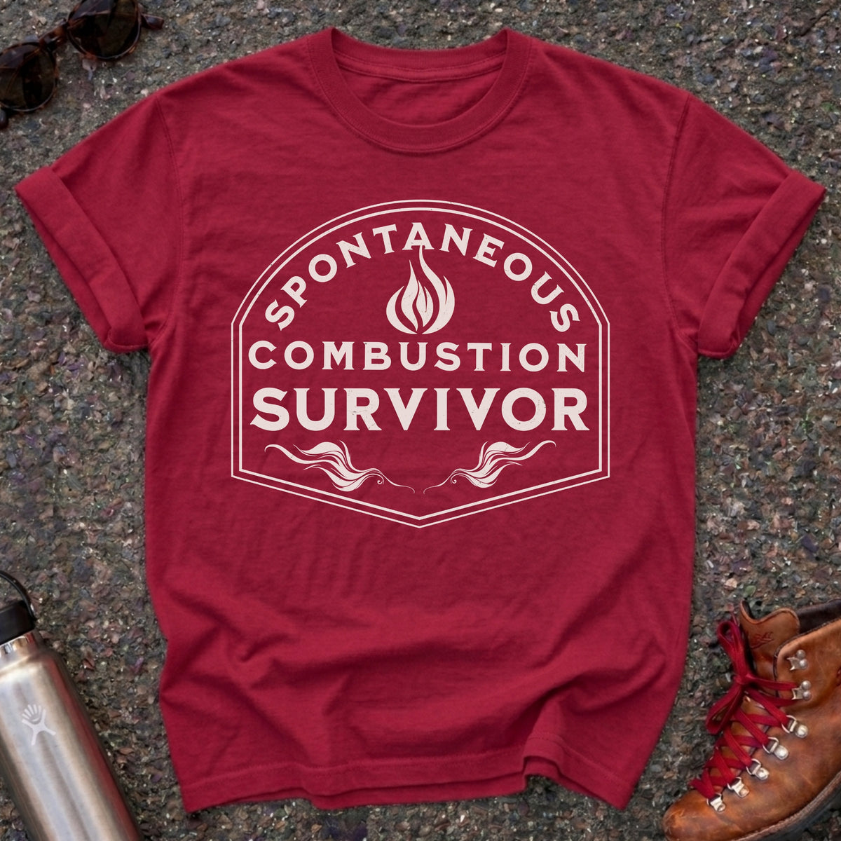 Comfort Colors t-shirt with a vintage flame badge reading Spontaneous Combustion Survivor