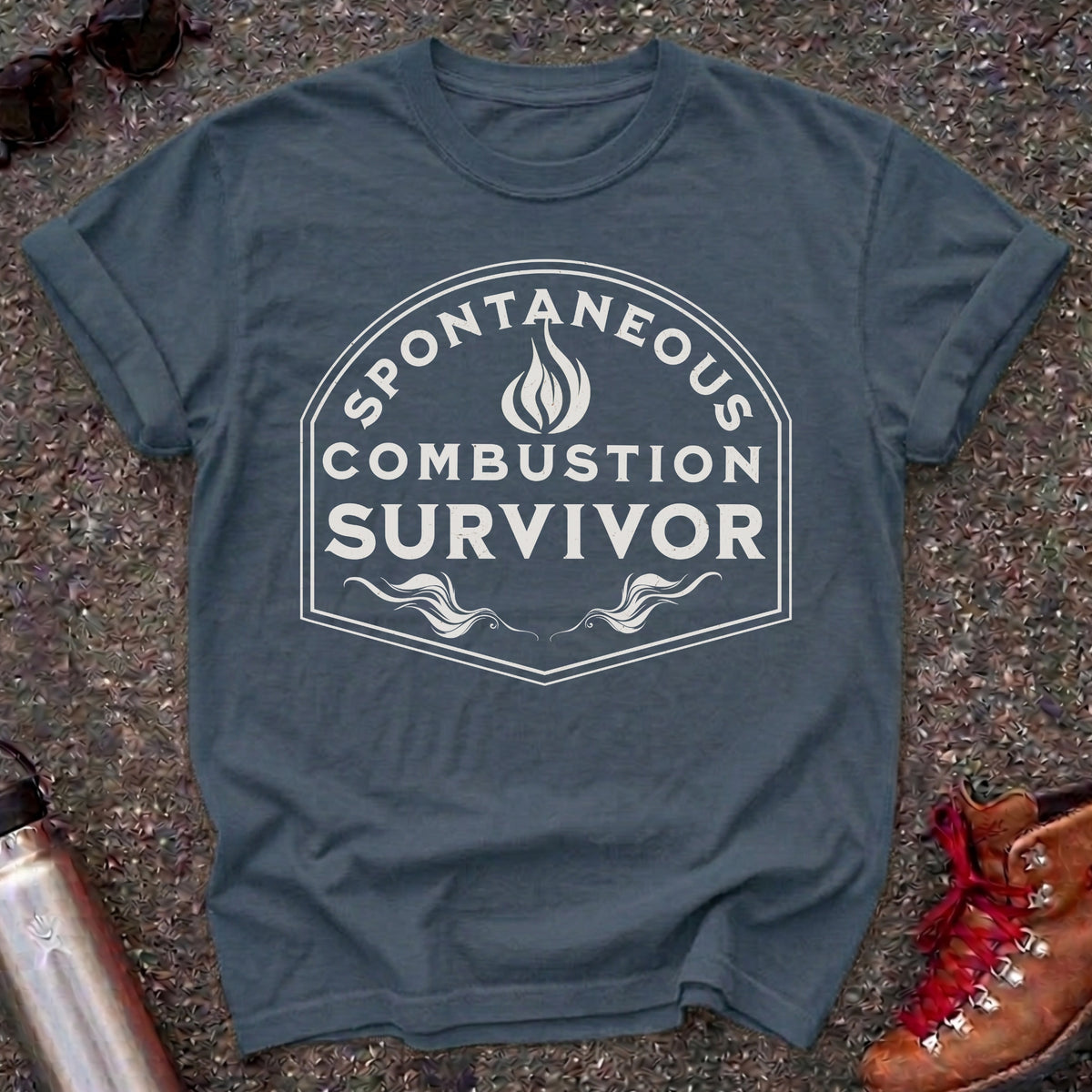 Comfort Colors t-shirt with a vintage flame badge reading Spontaneous Combustion Survivor