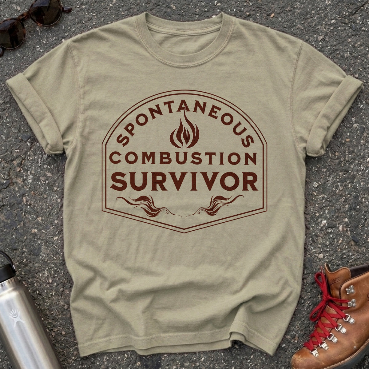 Comfort Colors t-shirt with a vintage flame badge reading Spontaneous Combustion Survivor
