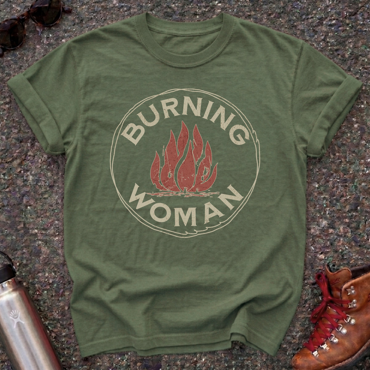 Comfort Colors t-shirt with a distressed red flame in a vintage circle badge and the words Burning Woman