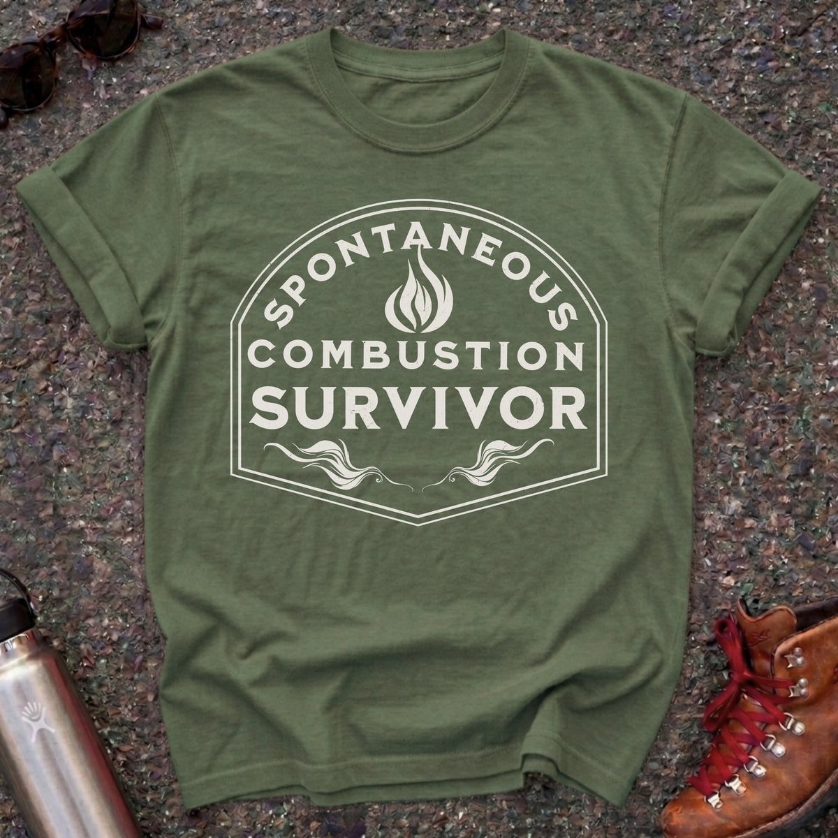 Comfort Colors t-shirt with a vintage flame badge reading Spontaneous Combustion Survivor