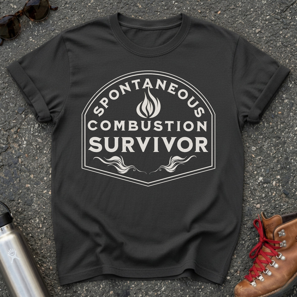 Comfort Colors t-shirt with a vintage flame badge reading Spontaneous Combustion Survivor