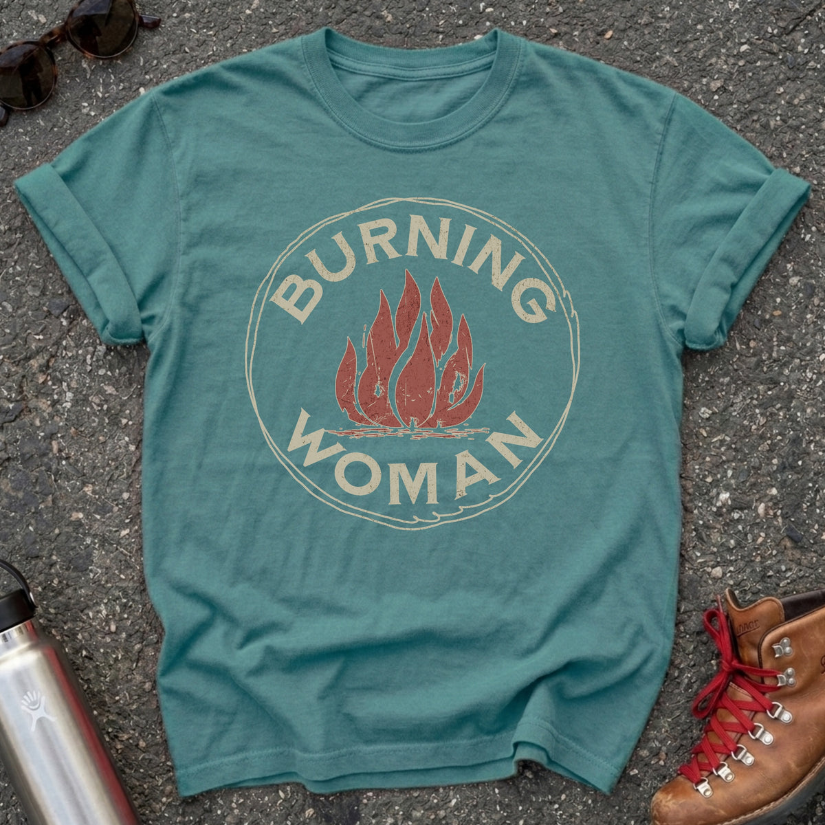 Comfort Colors t-shirt with a distressed red flame in a vintage circle badge and the words Burning Woman