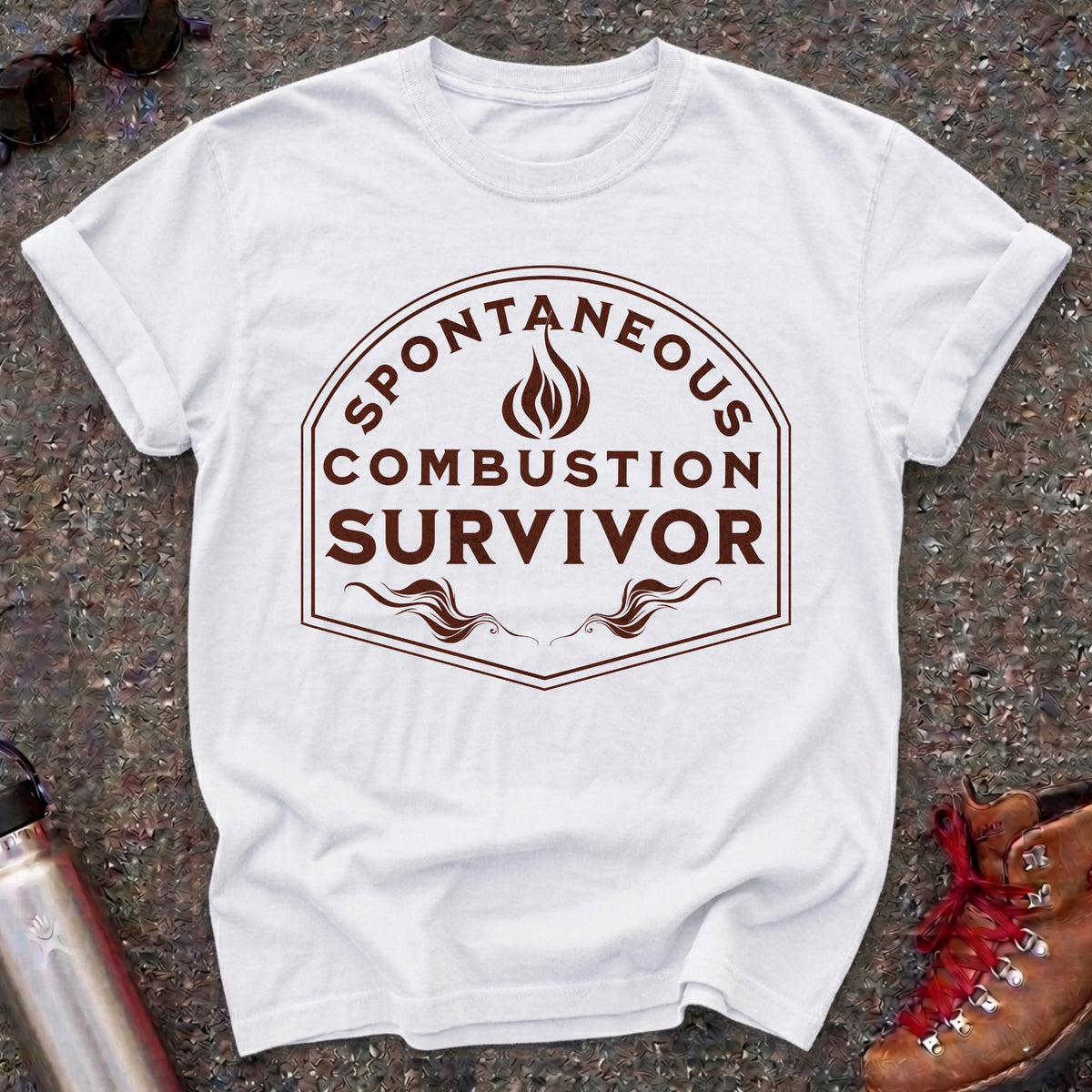 Comfort Colors t-shirt with a vintage flame badge reading Spontaneous Combustion Survivor